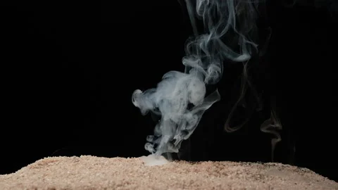 A full HD 1080p Slow motion video of a fuse wire being burnt under river sand Stock Footage 201492453