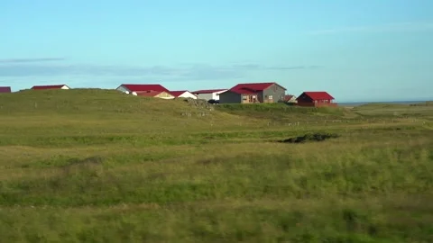 Full HD 5x slow motion:  driving in Iceland houses with red roofs Stock Footage 151824134