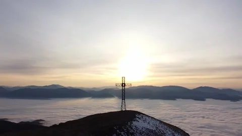 Full hd footage of clouds - orbit around the summit cross Stock Footage 166120043
