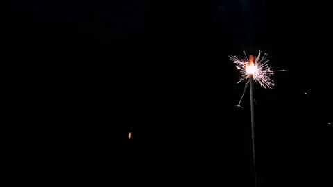A Full HD Slow motion video of a sparkler burning and sparking isolated Stock Footage 201491895