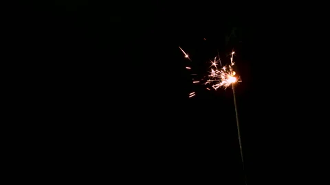A Full HD Slow motion video of a sparkler burning and sparking isolated Stock Footage 201491967