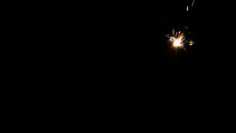 A Full HD Slow motion video of a sparkler burning and sparking isolated Stock Footage 201492956
