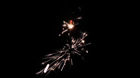 A Full HD Slow motion video of a sparkler burning and sparking isolated Stock Footage 201493008
