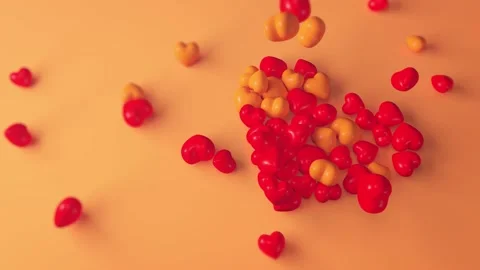 Full HD. Video background. Falling hearts on orange background Stock Footage 140611243