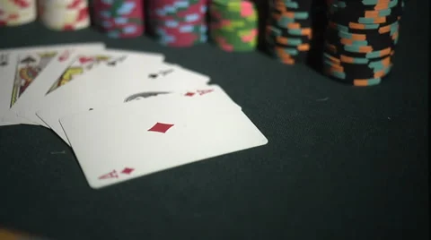Full House - Aces Full of Kings - Poker Hand with Stacks of Chips at Casino Stock Footage