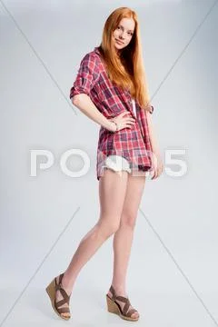 Full length beautiful red haired teen girl Stock Photos