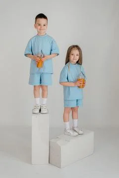 Full length body size view of attractive cheerful kids dancing moving having fun Stock Photos