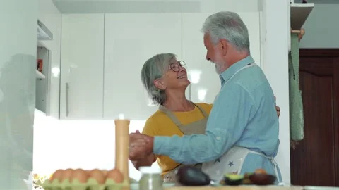 Full length energetic middle aged family couple dancing to disco music in k.. Stock Footage 236928267