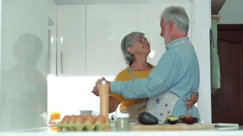 Full length energetic middle aged family couple dancing to disco music in k.. Stock-Footage 236928624