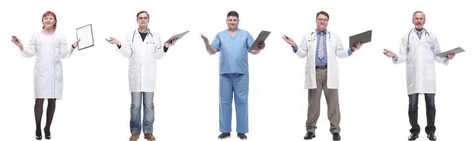 Full length group of doctors with notepad isolated Stock Photos
