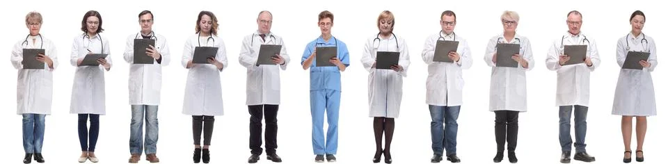Full length group of doctors with notepad isolated Stock Photos
