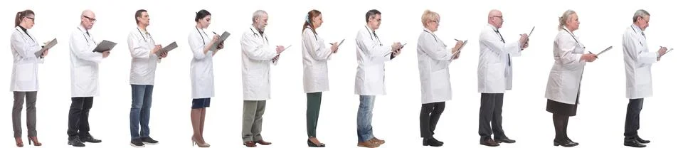 Full length group of doctors with notepad isolated Stock Photos