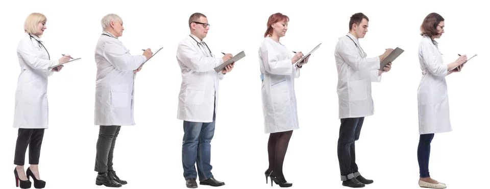 Full length group of doctors with notepad isolated 写真素材
