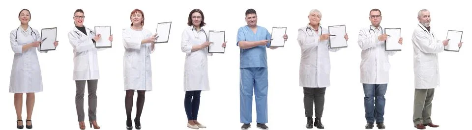 Full length group of doctors with notepad isolated 写真素材