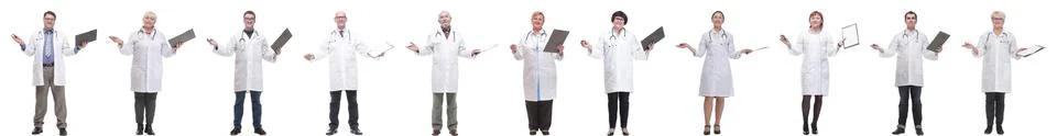 Full length group of doctors with notepad isolated 스톡 사진