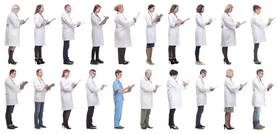 Full length group of doctors with notepad isolated 스톡 사진