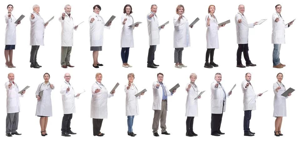 Full length group of doctors with notepad isolated Foto stock