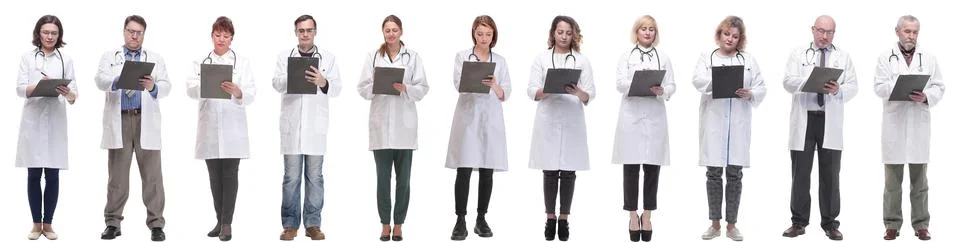 Full length group of doctors with notepad isolated Foto stock