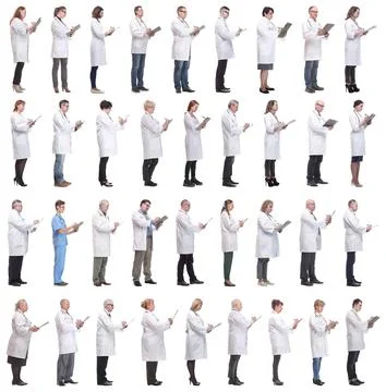 Full length group of doctors with notepad isolated Stock Photos