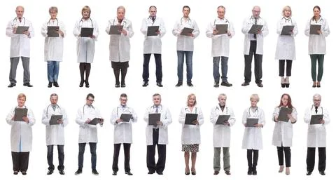Full length group of doctors with notepad isolated Foto stock