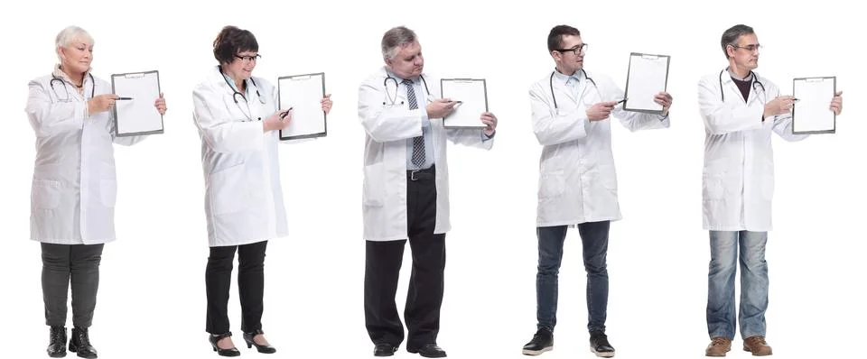 Full length group of doctors with notepad isolated Foto stock