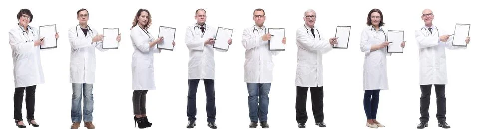 Full length group of doctors with notepad isolated Stock Photos