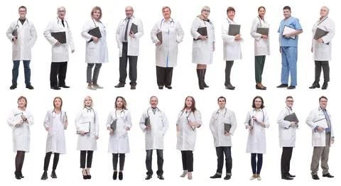 Full length group of doctors with notepad isolated Foto stock