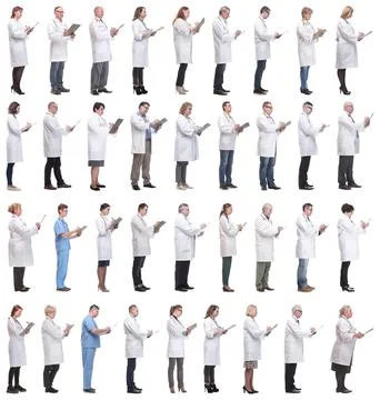 Full length group of doctors with notepad isolated Stock Photos