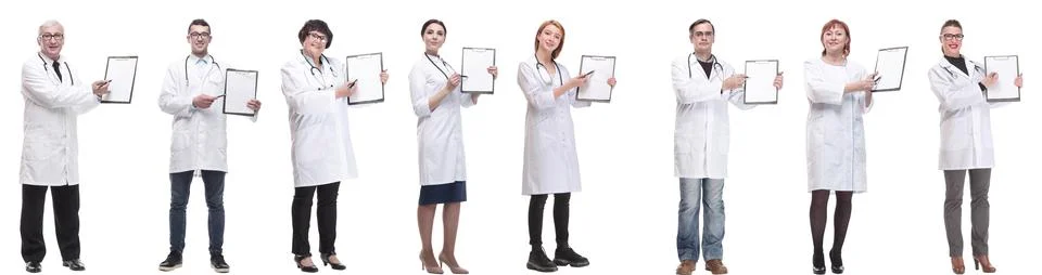 Full length group of doctors with notepad isolated Stock Photos