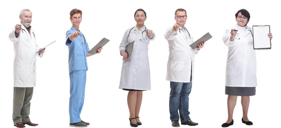 Full length group of doctors with notepad isolated 스톡 사진