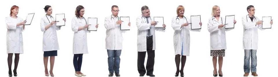 Full length group of doctors with notepad isolated Foto stock