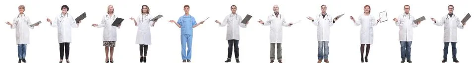 Full length group of doctors with notepad isolated Stock Photos