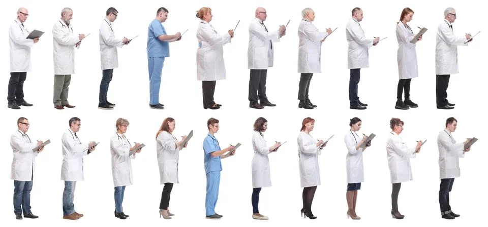 Full length group of doctors with notepad isolated Foto stock
