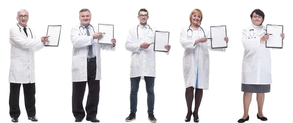 Full length group of doctors with notepad isolated Stock Photos