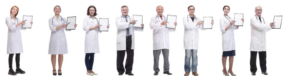 Full length group of doctors with notepad isolated Stock Photos