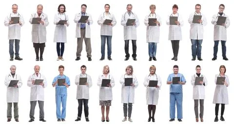Full length group of doctors with notepad isolated Foto stock