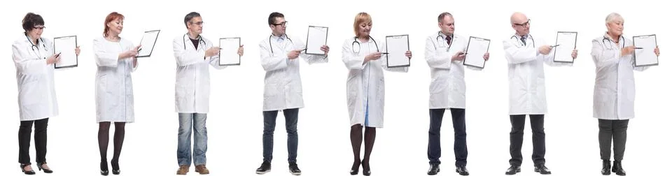 Full length group of doctors with notepad isolated Stock Photos