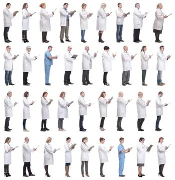Full length group of doctors with notepad isolated Stock Photos