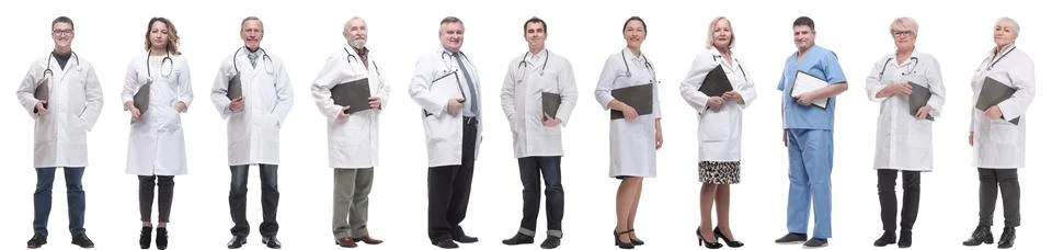 Full length group of doctors with notepad isolated Foto stock