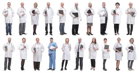 Full length group of doctors with notepad isolated Stock Photos