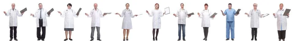 Full length group of doctors with notepad isolated 스톡 사진