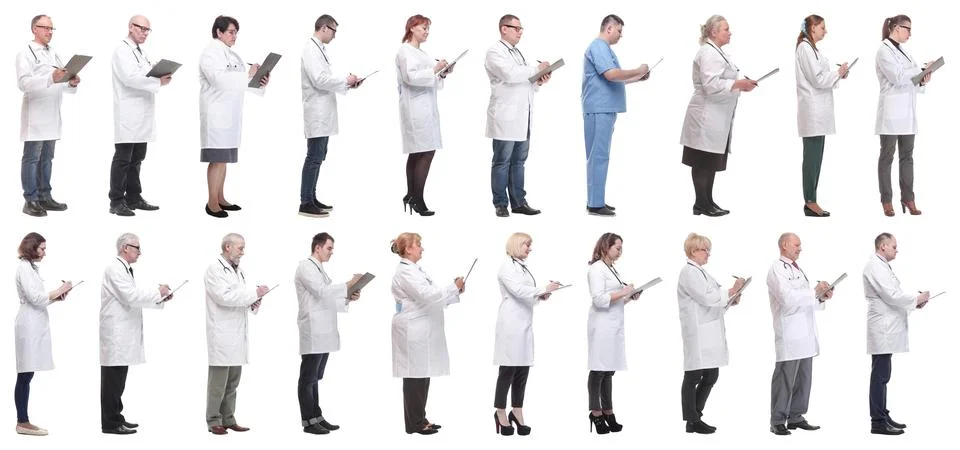 Full length group of doctors with notepad isolated Foto stock