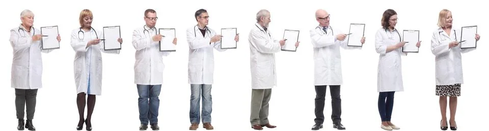Full length group of doctors with notepad isolated 스톡 사진