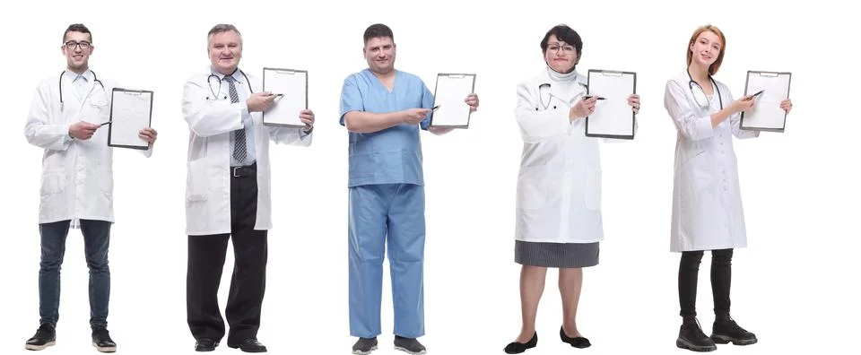 Full length group of doctors with notepad isolated 스톡 사진