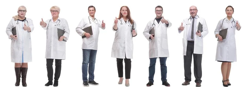 Full length group of doctors with notepad isolated Foto stock