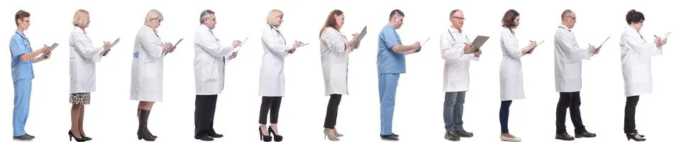Full length group of doctors with notepad isolated Stock Photos