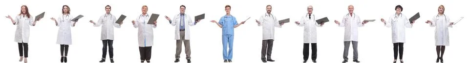 Full length group of doctors with notepad isolated Foto stock