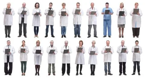 Full length group of doctors with notepad isolated Foto stock