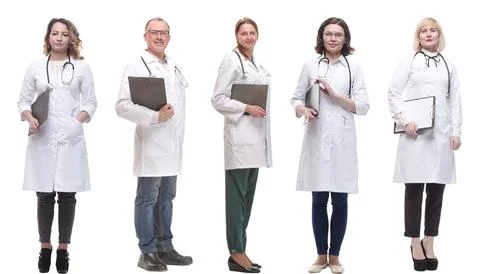 Full length group of doctors with notepad isolated 스톡 사진