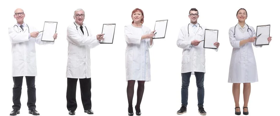 Full length group of doctors with notepad isolated 스톡 사진